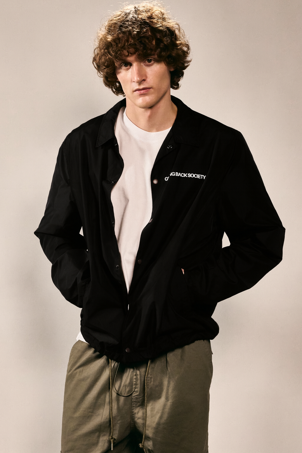 Unisex Coachjacke "NOT FOR PROFIT." black